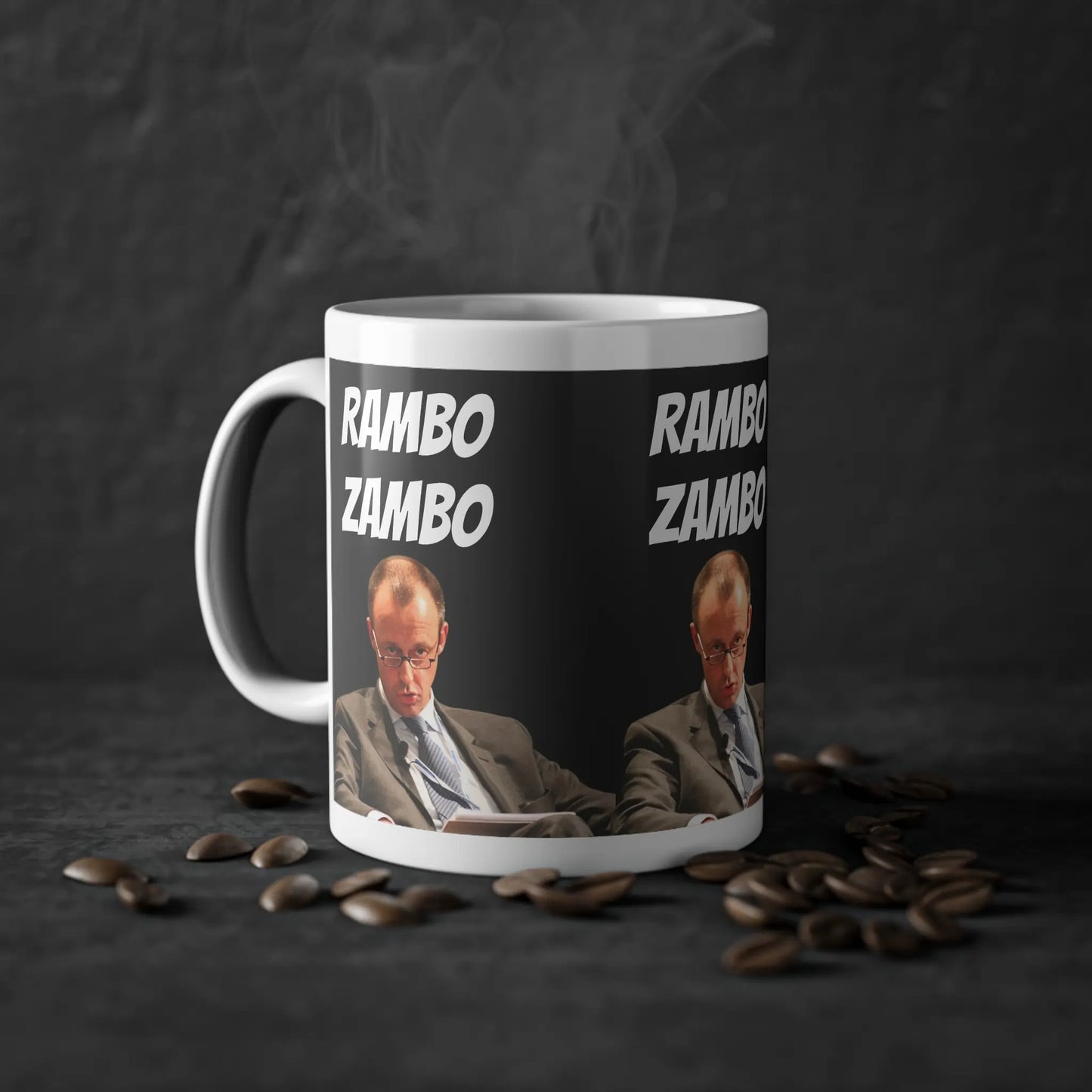 Weiß-schwarze Tasse mit Rambo Zambo-Aufschrift vor dunklem Hintergrund, ideal als lustige Politik Tasse für CDU Merch-Sammler.